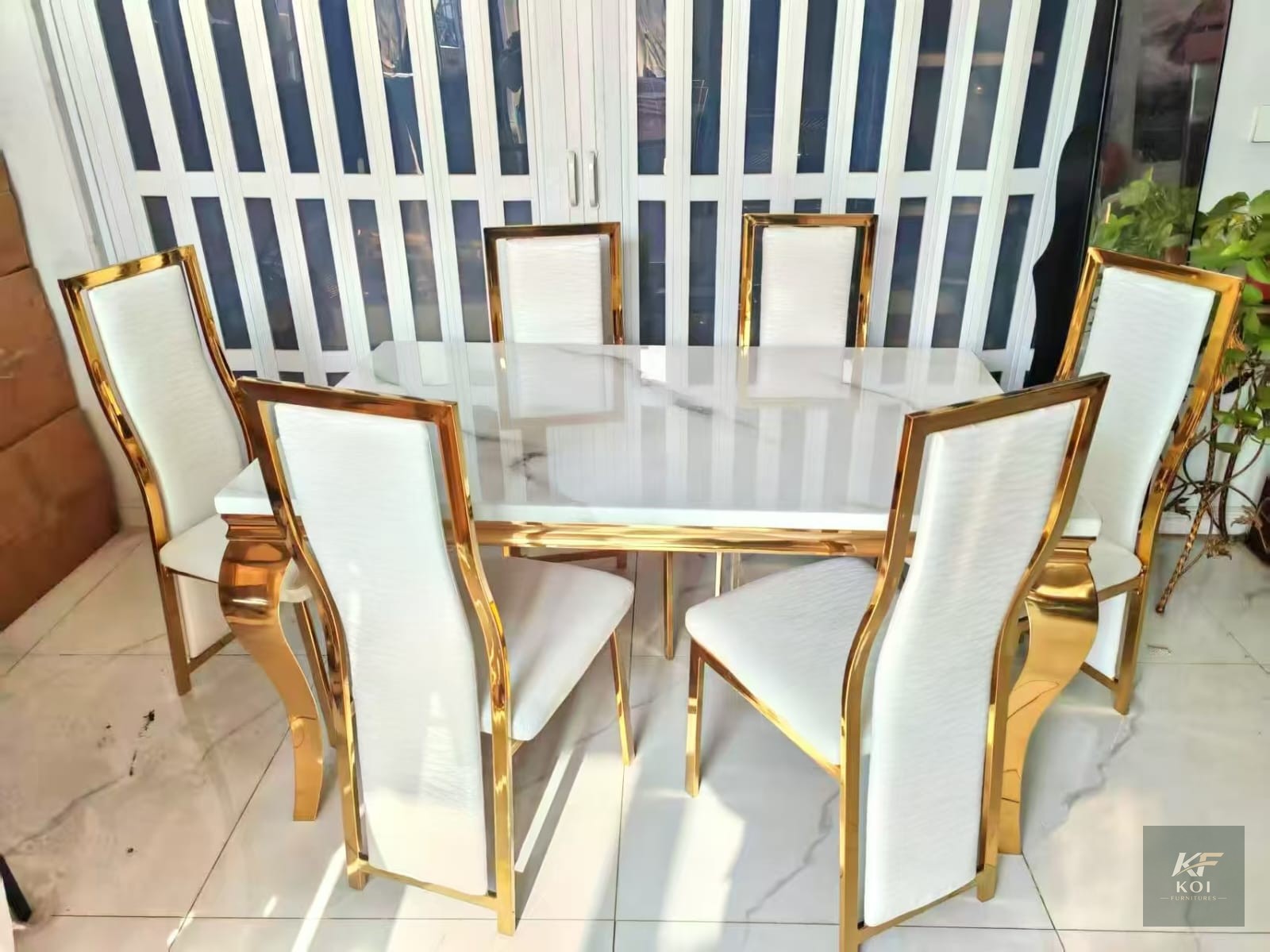 modern 6-seater marble and gold dining set, 6-seater dining set, marble dining table and chairs, gold dining set, marble and gold dining table, modern dining table set, luxury dining set, elegant dini