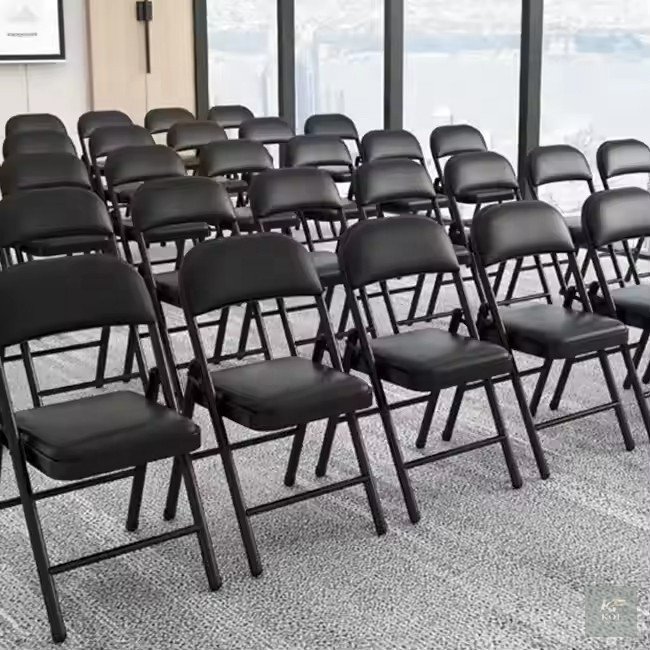 sleek black foldable chair, black foldable chair, folding chair, modern folding chair, portable folding chair, collapsible chair, space-saving folding chair, lightweight folding chair, black folding s