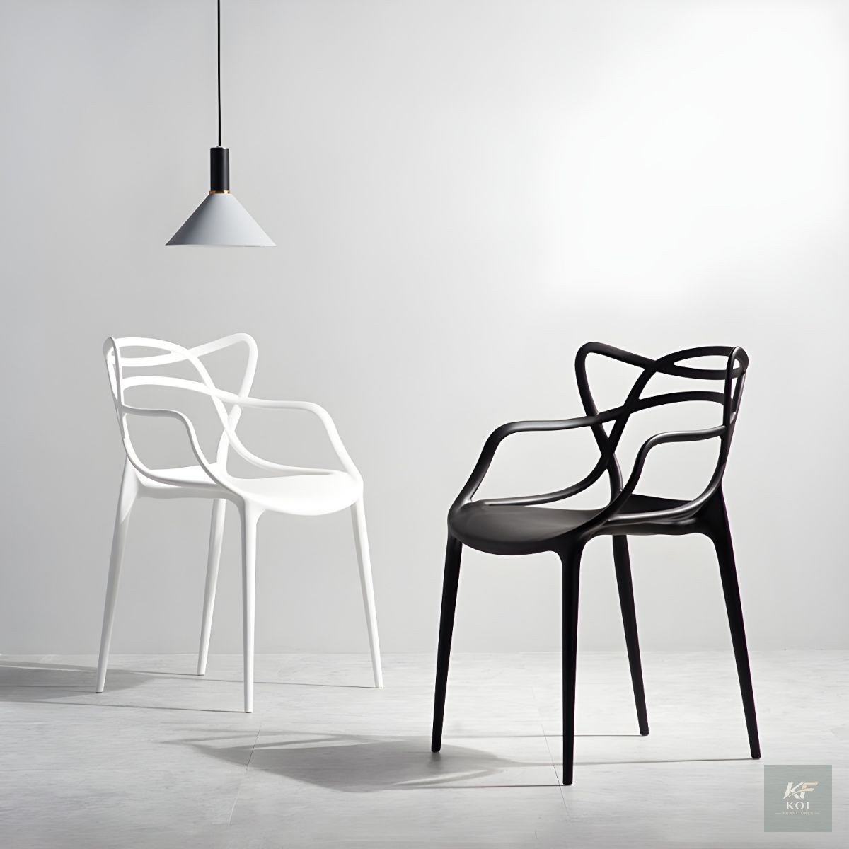 sleek black plastic armchair, black plastic armchair, modern black armchair, stylish plastic armchair, contemporary black chair, black arm chair, durable plastic chair, molded plastic armchair, modern